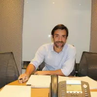 Thomas, Biotech Investment Executive, reviewing 1.5-year Business Mandarin course with Nihao Language Education Central HK