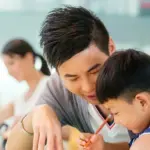Professional male Mandarin tutor providing dedicated 1-on-1 Chinese literacy coaching to a young student at Nihao Language Education Hong Kong.